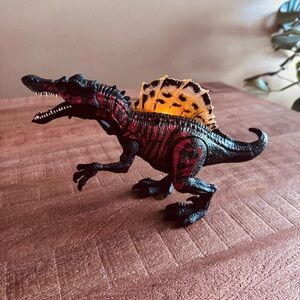 Animal Planet Spinosaurus toy. 
BATTERIES NOT INCLUDED.